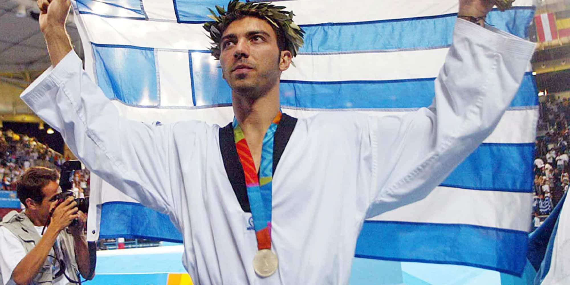 O Ολυμπιονίκης Αλέξανδρος Νικολαΐδης με το μετάλλιο